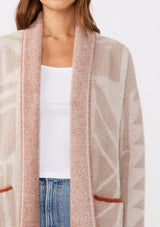 [Color: Oatmeal/Natural] A cozy, fuzzy texture cardigan with an abstract geometric print and contrasting trim. Featuring an open front, side patch pockets, and long sleeves. The perfect mid length cardigan for the Fall season. 