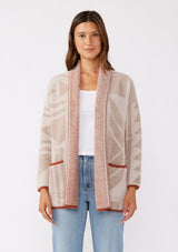 [Color: Oatmeal/Natural] A cozy, fuzzy texture cardigan with an abstract geometric print and contrasting trim. Featuring an open front, side patch pockets, and long sleeves. The perfect mid length cardigan for the Fall season. 