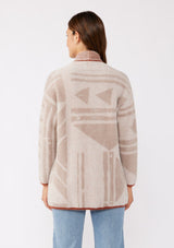 [Color: Oatmeal/Natural] A cozy, fuzzy texture cardigan with an abstract geometric print and contrasting trim. Featuring an open front, side patch pockets, and long sleeves. The perfect mid length cardigan for the Fall season. 