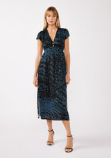 [Color: Midnight/Black] A full body front facing image of a blonde model wearing a black and blue leopard print maxi dress. With a deep v neckline, short sleeves, elastic waistline, and side slits. A versatile holiday dress, perfect for casual outings and special occasions. 