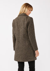 [Color: Brown/Black] A back facing image of a blonde model wearing a classic notched lapel coat with a chevron stripe pattern in brown. Featuring a button front and side pockets. The perfect fall staple for any occasion. 