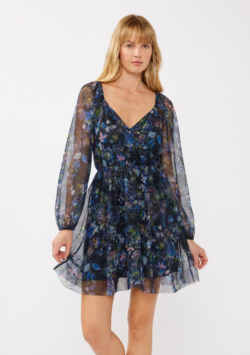 [Color: Black/Dusty Pink] A front facing image of a blonde model wearing a blue floral print mini dress crafted in a lightweight micro mesh fabric. With a surplice v-neckline, long sleeves, elastic faux wrap waist, and elastic shoulders. Perfect for evening dinners and weddings. 