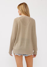 [Color: Taupe] A back facing image of a blonde model wearing a thin linen and viscose blend cardigan with long sleeves, a button front, and a v-neckline. An effortless basic throw on cardigan for the spring season. 