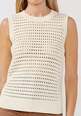 [Color: Ivory] A detail image of a blonde model wearing an ivory sleeveless open knit sweater vest with a crew neckline, ribbed trim, and side slits. Perfect for layering over long sleeves or wearing on its own. 