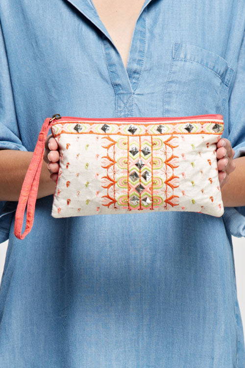 [Color: Pink Combo] A pink boho embroidered zipper pouch with a quilted back and stud accents. Complete with an attached wristlet strap for easy carrying. 