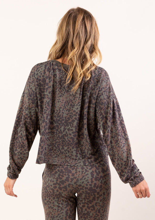 [Color: Charcoal Combo] A soft pullover sweatshirt in a grey animal print. 