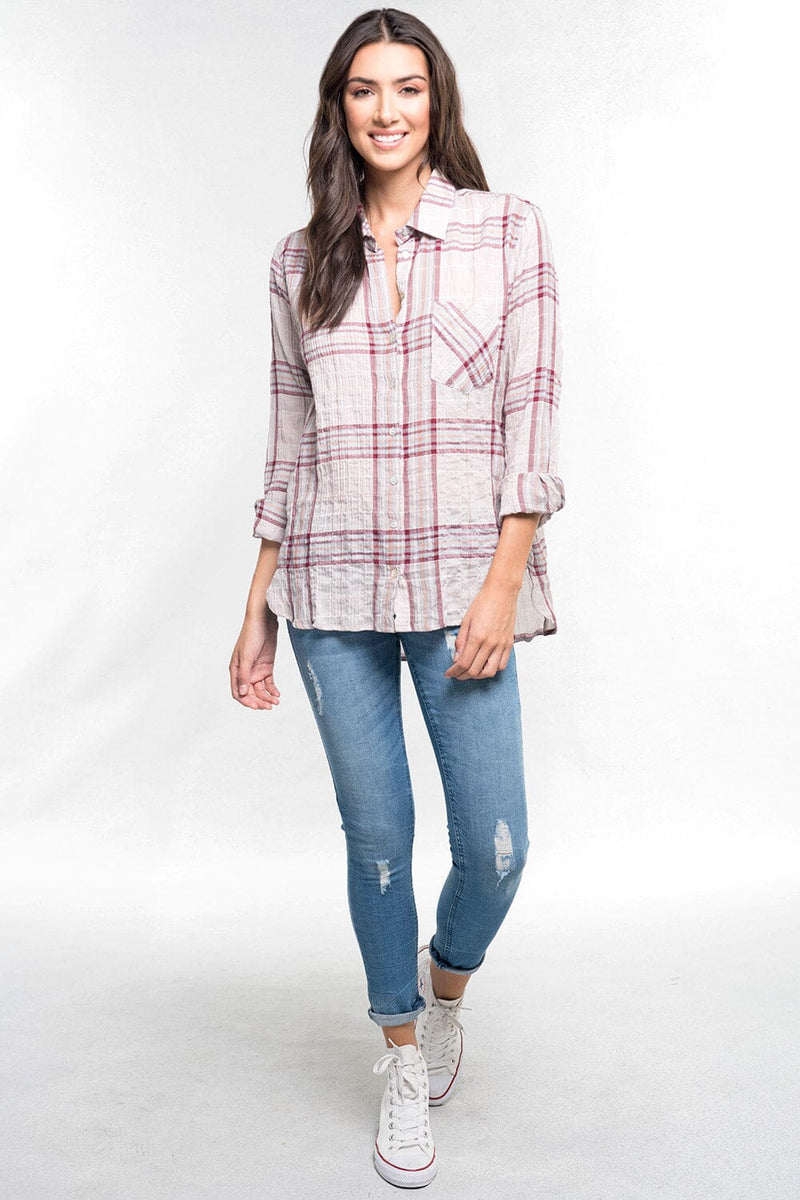 [Color: Taupe/Grey/Burgundy] A front facing  image of a brunette model wearing a wine red plaid button down shirt with a classic collar neckline, roll tab sleeves, and a high low hemline. 