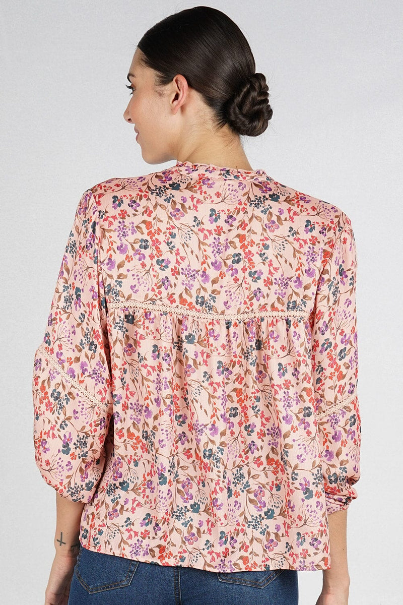 [Color: Desert Rose/Teal] Lovestitch pink floral, silken peasant top with a lattice trim, split v-neckline with tie detail, and 3/4 sleeves. Perfect modern boho blouse for casual outings. 