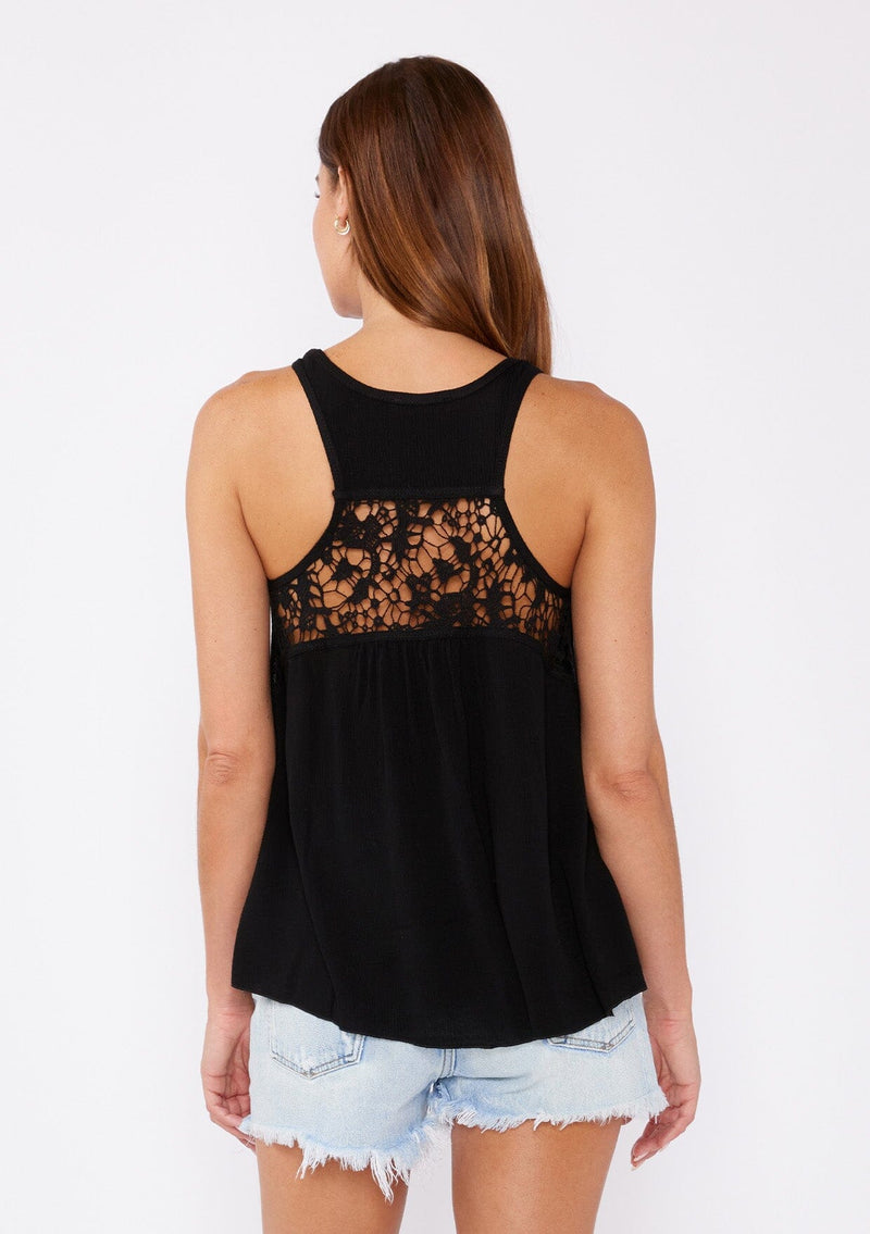 [Color: Black] A casual warm weather top. This tank top features a swing silhouette, crochet lace details, twist strap, and scoop neckline. The perfect breathable top for the summer season.