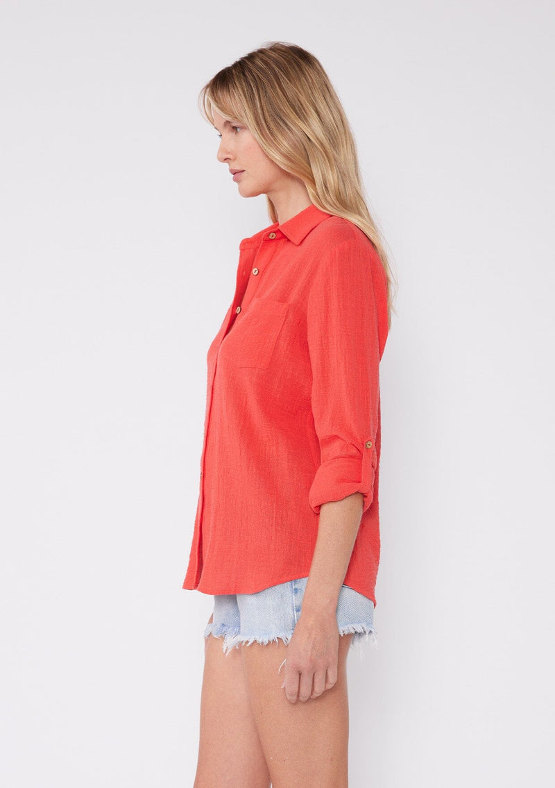 [Color: Coral] breathable cotton blouse with comfortable roll tab sleeves and button cuffs. Features a classic collared neckline, functional button front, and patch pocket. An everday versatile top for the Summer season.