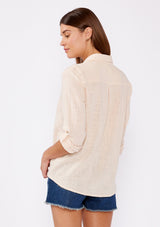 [Color: Natural] breathable cotton blouse with comfortable roll tab sleeves and button cuffs. Features a classic collared neckline, functional button front, and patch pocket. An everday versatile top for the Summer season.