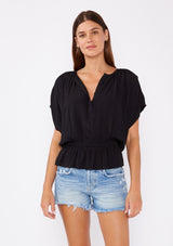 [Color: Black] Black bohemian chic peplum top with a cute button front detailand flattering short sleeves with pleated details. 