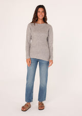 [Color: Heather Grey] A front facing image of a brunette model wearing a high neckline pullover sweater with long sleeves and ribbed details. 