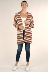 [Color: Natural/Burgundy Multi] A front facing image of a brunette model wearing a cozy striped knit cardigan with subtle metallic thread accents. Featuring a relaxed dropped shoulder and side patch pockets.