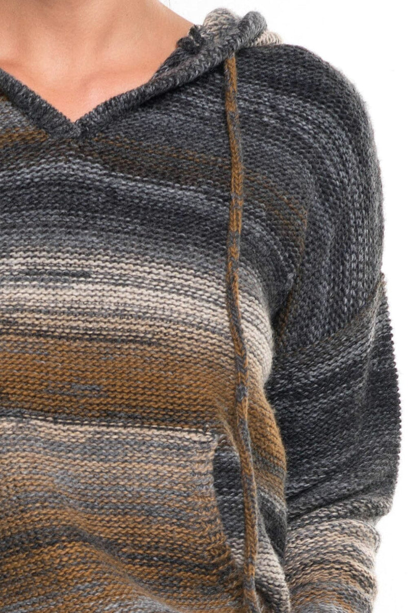 [Color: Grey/Bronze] A detail image of a brunette model wearing a grey and brown space dye knit hoodie with an adjustable drawstring, dropped shoulders, and kangaroo pockets. 