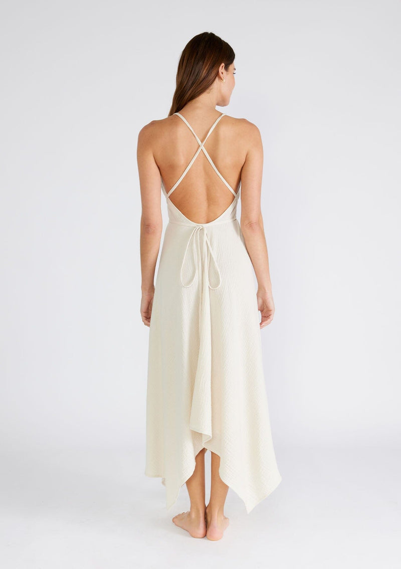 Five Backless Pieces to Wear This Winter - Into The