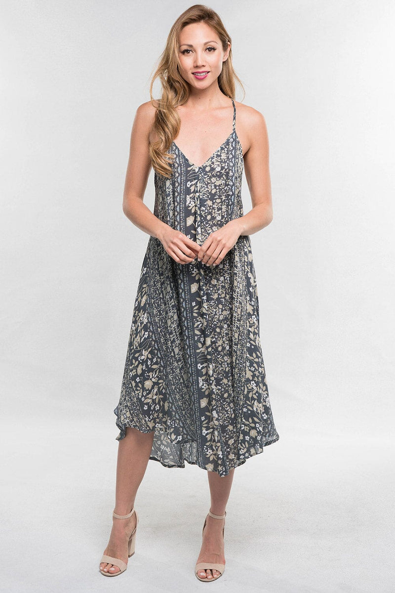 [Color: Charcoal/Mint] A blonde model wearing a floral boho midi dress with a sleeveless design, halter neck tie, racerback, and a handkerchief hemline. 