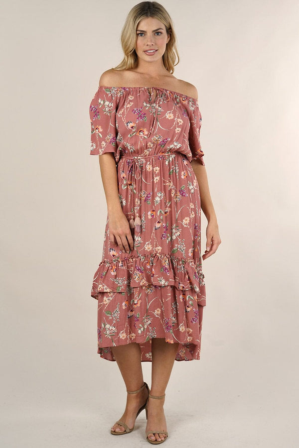 [Color: Terracotta/Blush Combo] A blonde model wearing an off shoulder midi dress in a spring summer pink floral print. A flowy tiered midi dress with an elastic neckline, elastic waistline with adjustable tie detail, and short sleeves. 