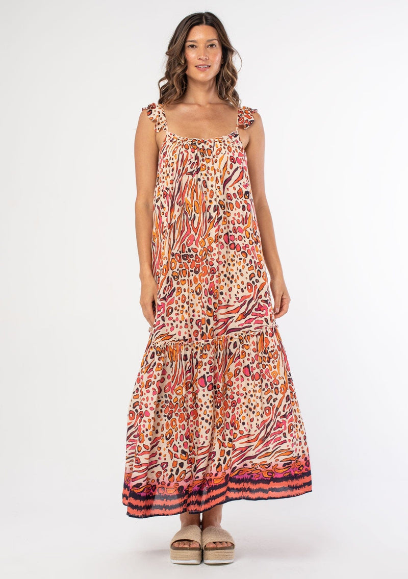 [Color: Natural/Fuchsia] A front facing image of a brunette model wearing a pink and orange natural abstract leopard print sleeveless maxi dress with a flowy relaxed fit and ruffled tank top straps. A statement dress for the spring and summer season. 