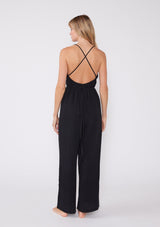 [Color: Black] Lightweight cotton gauze jumpsuit featuring flattering wide legs, a halter v-neckline and strappy open back. A breathable cotton fabric designed to keep you cool all summer long.