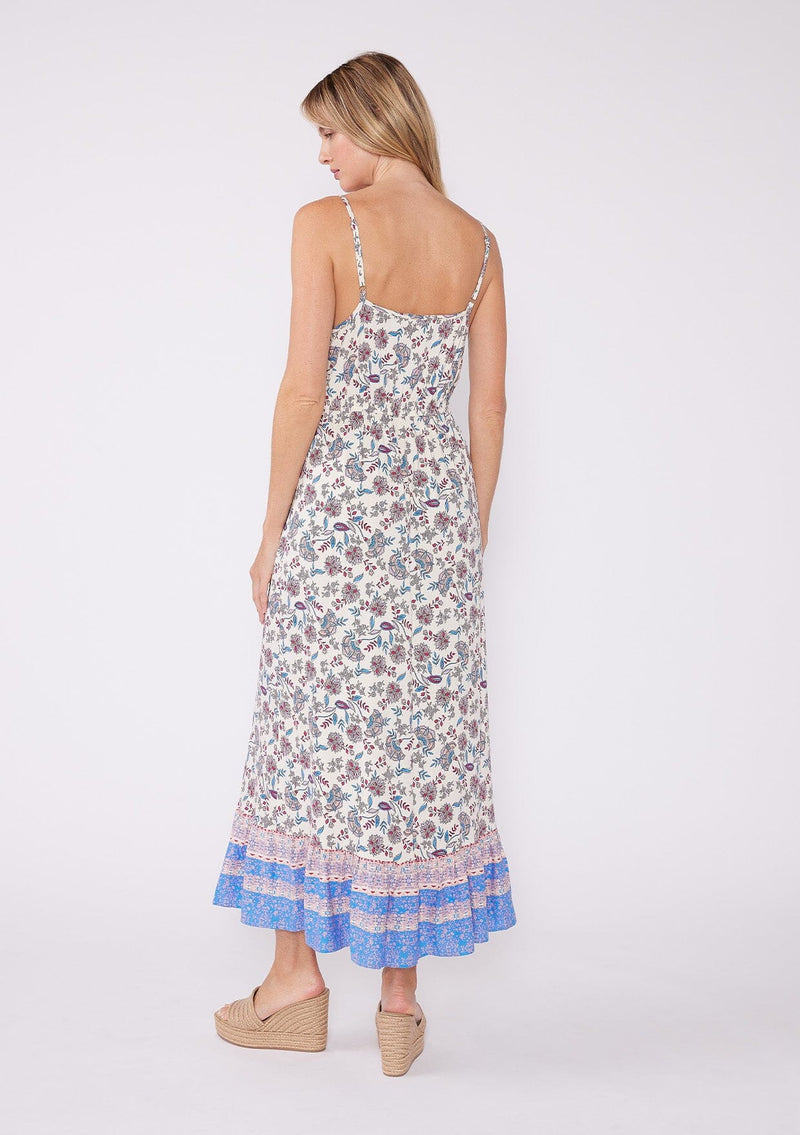 [Natural/Magenta] A pretty white summer maxi dress featuring vintage inspired pink and blue floral print, an adjustable cinched tie waist, spaghetti straps and a flowy tiered ruffle hem.