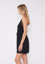 [Color: Black] Cute little black mini dress featuring a lace v neckline, racer back, spaghetti straps and a flattering adjustable cinched waist. 