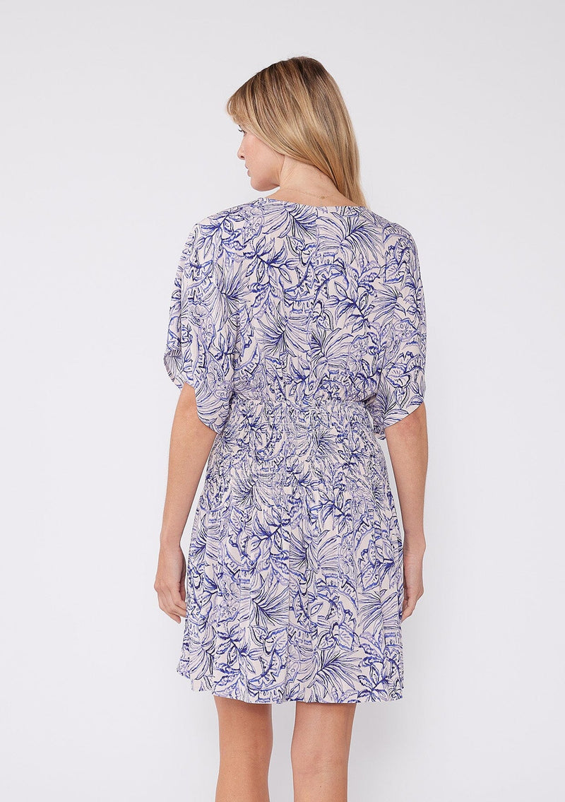 [Color: Bone/Lilac] Bohemian chic white mini dress with a deep v neckline, relaxed kimono sleeves and purple floral sketch print.