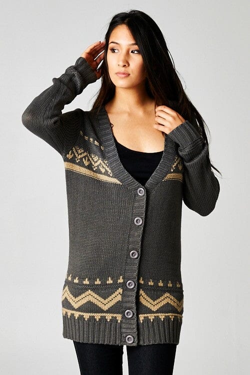 [Color: Grey/Taupe] A front facing image of a brunette model wearing a black and beige button front cardigan with a southwestern design, long sleeves, deep v-neckline, and ribbed trim. 