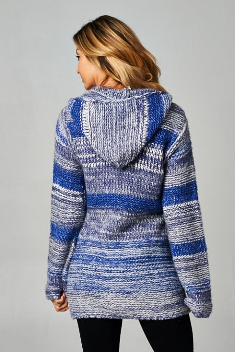 [Color: Denim Blue] A blonde model wearing a blue marled stripe knit cardigan with a zipper front, hoodie, and patch pockets. 