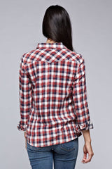 [Color: Cream/Multi] A brunette model wearing a red blue plaid shirt with a collared neckline, snap button front, long sleeves, and patch pockets. 