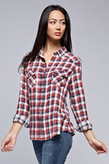 [Color: Cream/Multi] A brunette model wearing a red blue plaid shirt with a collared neckline, snap button front, long sleeves, and patch pockets. 