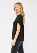 [Color: Dark Green] A blonde model wearing a classic green top with a unique puff sleeve. Featuring a split v-neckline, relaxed fit, and wide elastic cuffs with split detail. A solid olive green top perfect for the office or casual outings.