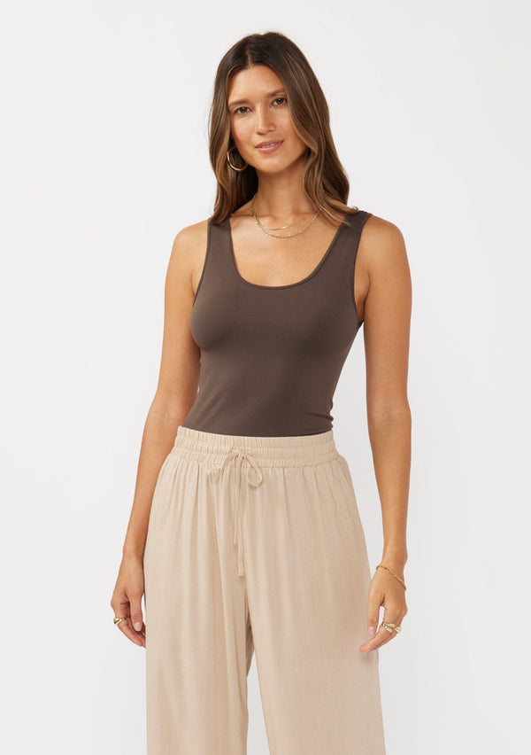 [Color: Fudge] A front facing image of a seamless dark brown tank top.