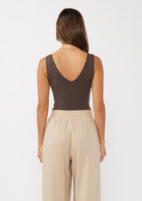 [Color: Fudge] A back facing image of a seamless dark brown tank top.