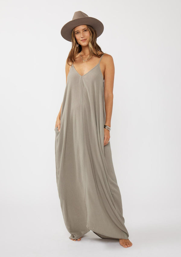 [Color: Cement] A grey harem maxi dress. This billowy maxi tank top dress features a deep v neckline, adjustable spaghetti straps, and a cocoon fit.