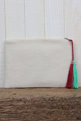 [Color: Yellow/Natural] A boho multi color embroidered clutch bag with a tassel zipper pull. 