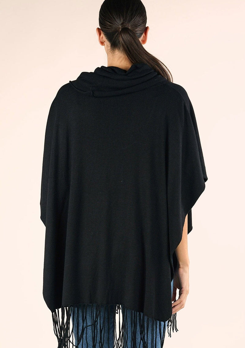 [Color: Black] A classic bohemian fringed sweater poncho with oversized cowl neckline. 