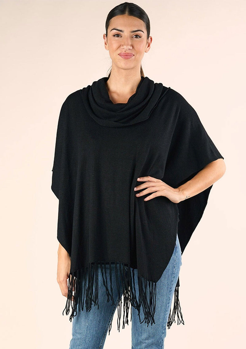 [Color: Black] A classic bohemian fringed sweater poncho with oversized cowl neckline. 