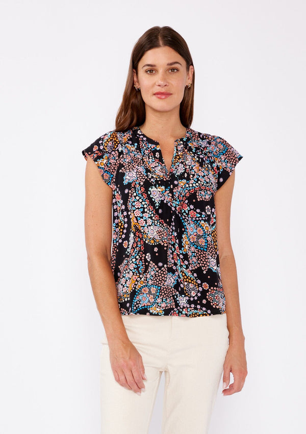[Color: Black/Light Blue] An image of a brunette model wearing a multi color floral print bohemian top crafted from lightweight rayon fabric. With short cap sleeves, a split v neckline, and gathered details at the yoke. A summer to fall blouse perfect for casual outings. 