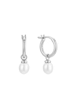  [Color: Silver] A delicate hoop earring with an oval charm crafted from mother of pearl. The hoop is hypoallergenic, made with fourteen karat white gold plated sterling silver. Designed by the salty gem. 