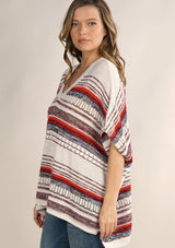 [Color: Cream/Red] A lightweight bohemian sweater poncho pullover top in a mixed stripe. With short sleeves, a v neckline, and a relaxed fit. 