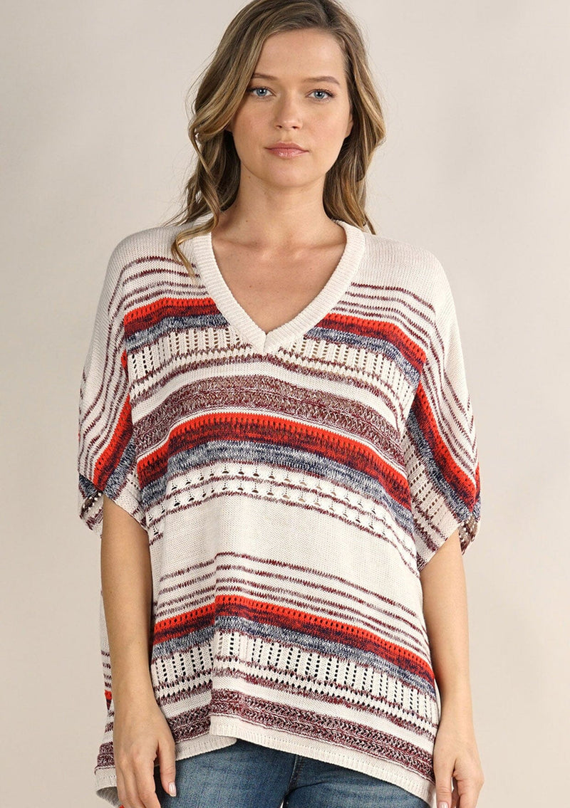 [Color: Cream/Red] A lightweight bohemian sweater poncho pullover top in a mixed stripe. With short sleeves, a v neckline, and a relaxed fit. 