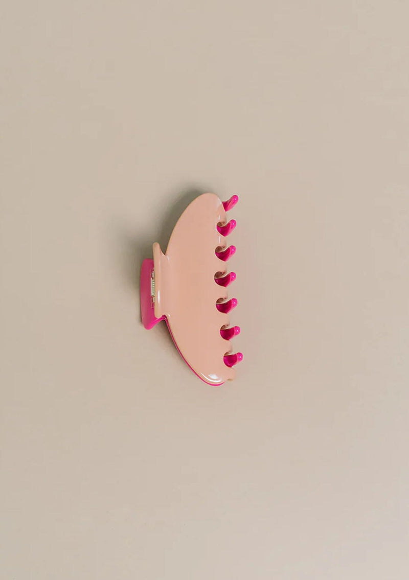 [Color: Dragon Fruit] A two tone pink medium sized hair clip by Nat and Noor. 