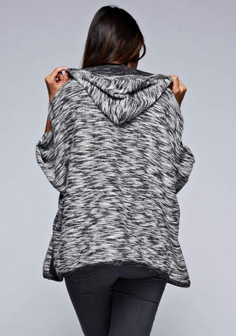 [Color: Black/Off White] A black and off white French terry hooded poncho. 