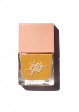 [Color: Goldenrod] Non-toxic nail polish with a matte, satin sheen finish. Formulated by Glam & Grace.