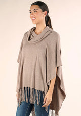 [Color: Heather Grain] A classic bohemian fringed sweater poncho with oversized cowl neckline. 