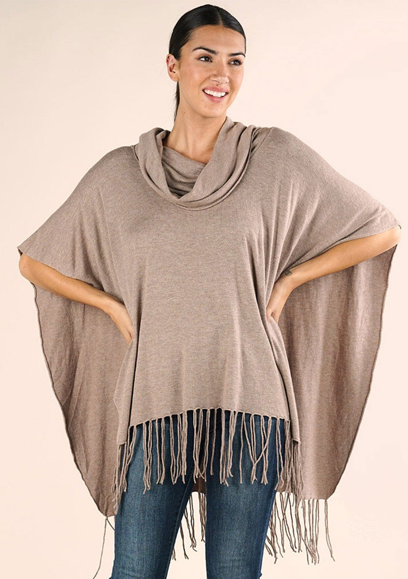 [Color: Heather Grain] A classic bohemian fringed sweater poncho with oversized cowl neckline. 