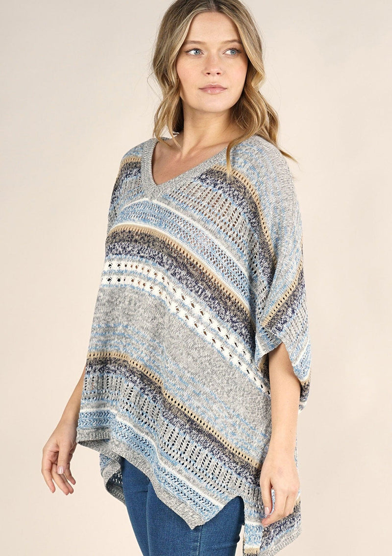 [Color: Grey/Blue] A lightweight bohemian sweater poncho pullover top in a mixed stripe. With short sleeves, a v neckline, and a relaxed fit. 