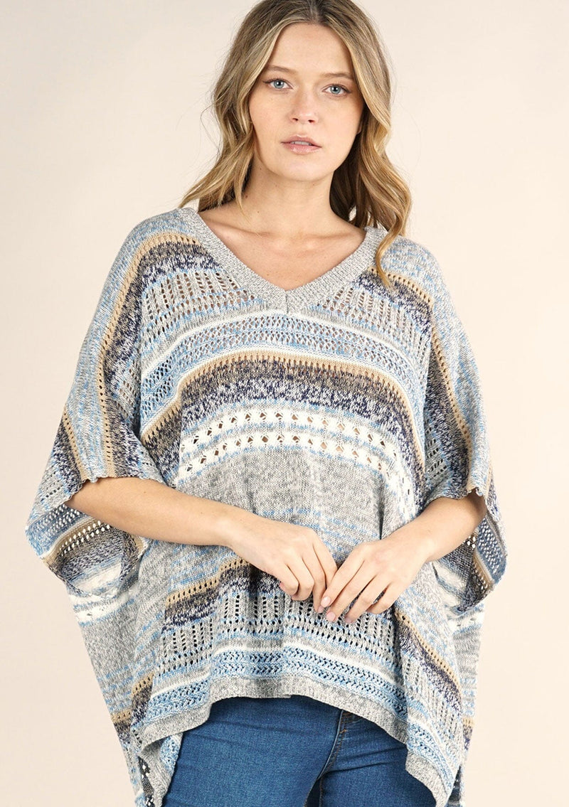 [Color: Grey/Blue] A lightweight bohemian sweater poncho pullover top in a mixed stripe. With short sleeves, a v neckline, and a relaxed fit. 