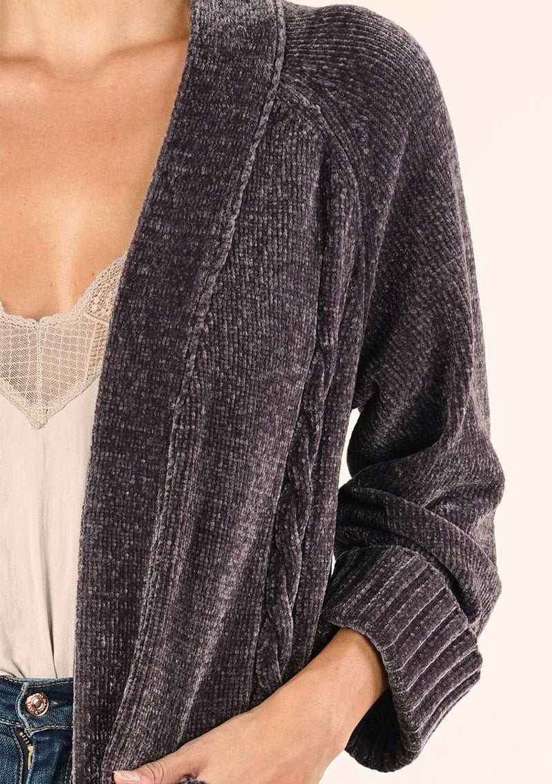 [Color: Charcoal] A close up front facing image of a brunette model wearing a soft grey chenille knit duster cardigan. With long sleeves, an open front, and side pockets. 